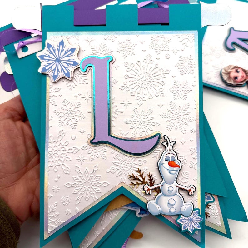 May include: A white ceramic mug with a black handle and the text "But First, Coffee" in a bold, black font. The mug is set against a neutral background, highlighting its simple design.