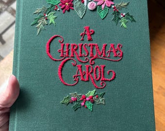 Hand embroidered "A Christmas Carol", with fore edge painting. Altered book art.