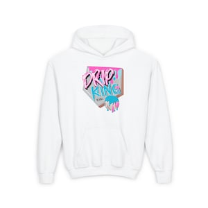 May include: White hooded sweatshirt with a graphic that says "DRIP KING" in pink and blue. The graphic has a dripping effect and a cartoon ice cream cone design. The sweatshirt has a front pocket.