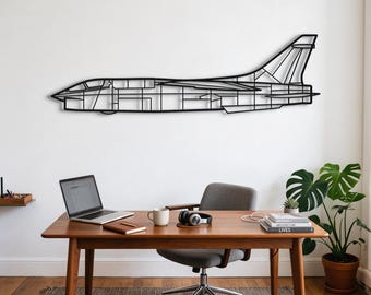 May include: A black metal wall art piece shaped like the side profile of a fighter jet. The design features a linear, open-frame construction that outlines the fuselage, cockpit, wings, and tail section of the aircraft in a minimalist style.