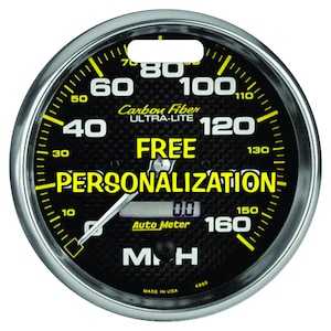 May include: A black and yellow speedometer with a carbon fiber design. The speedometer has a white needle and a digital display that reads "0.0". The text "Carbon Fiber ULTRA-LITE" and "FREE PERSONALIZATION" is printed on the face of the speedometer.