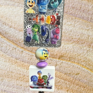 Disney Badge Reel, Pixar, Inside Out, movie, acrylic, glitter, retractable badge holder, badge ID, DisneyPlus, kid friendly reels
