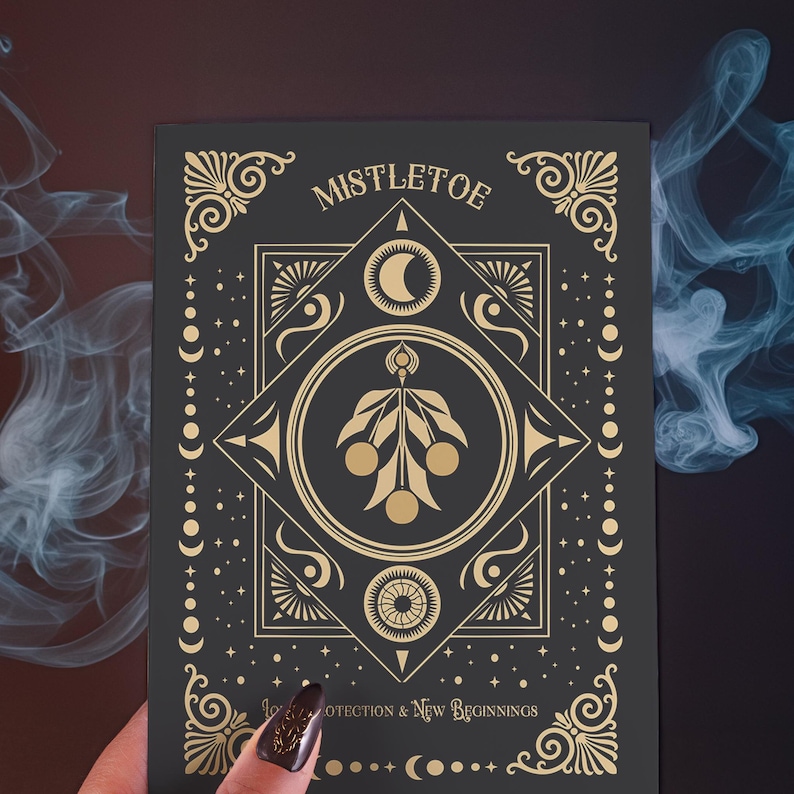 Luxurious black Yule card featuring golden mistletoe design, moon phases, and stars. "Mistletoe" and "For Protection & New Beginnings" in ornate gold text.