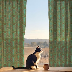 Sheer curtain panel featuring an intricate pattern of luminous emerald green Luna moths on an amber background. The design shows symmetrical rows of moths with delicate wing details and botanical elements in a vertical arrangement.