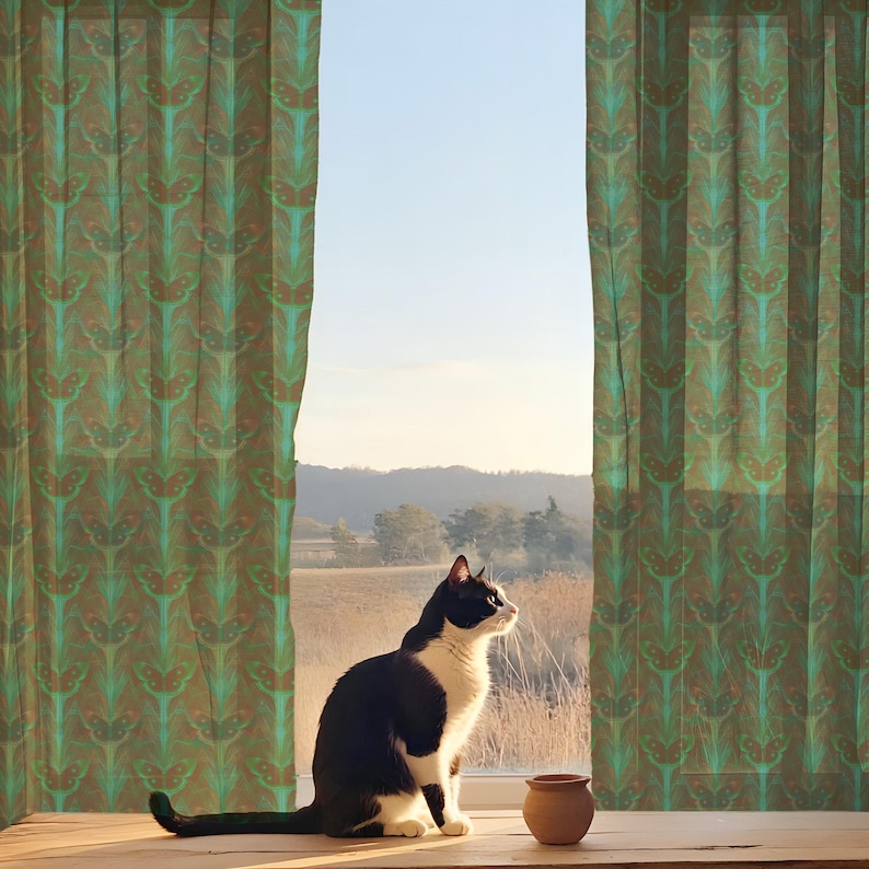 Sheer curtain panel featuring an intricate pattern of luminous emerald green Luna moths on an amber background. The design shows symmetrical rows of moths with delicate wing details and botanical elements in a vertical arrangement.