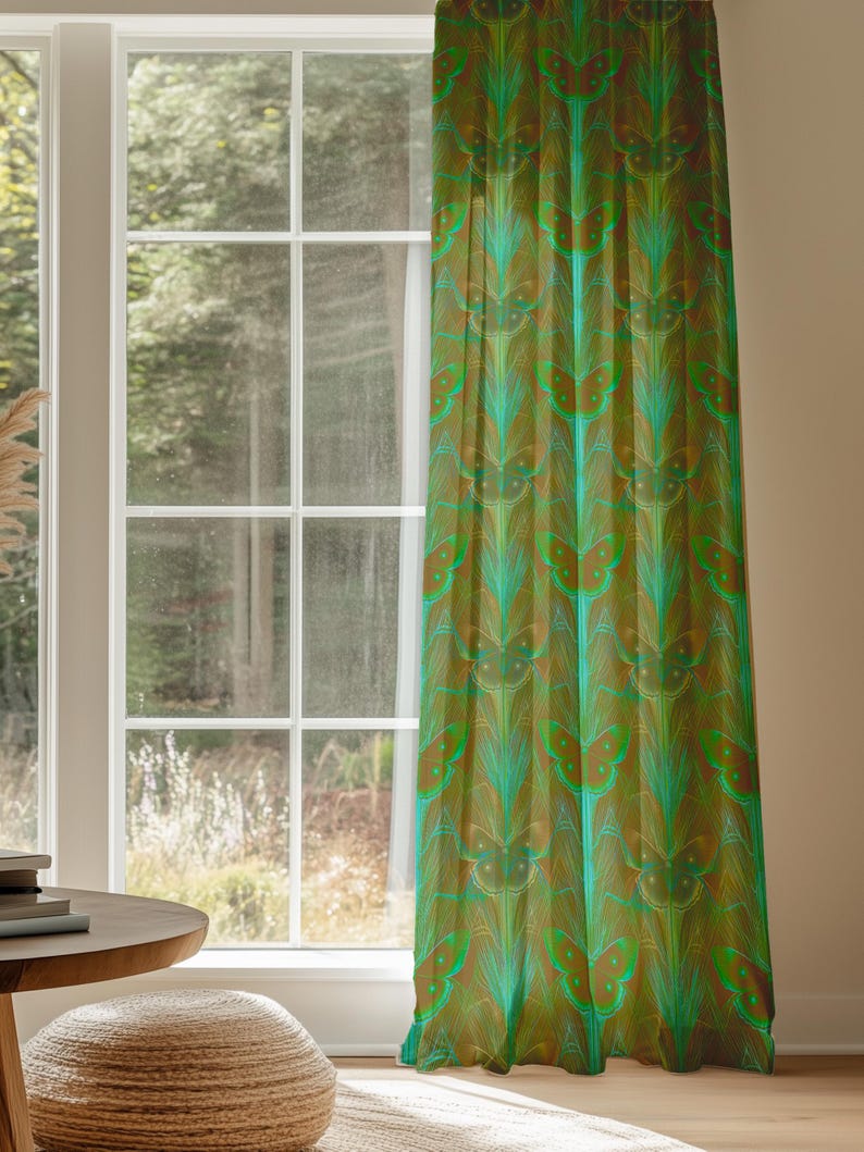 Sheer curtain panel featuring an intricate pattern of luminous emerald green Luna moths on an amber background. The design shows symmetrical rows of moths with delicate wing details and botanical elements in a vertical arrangement.