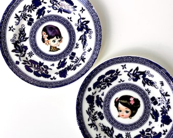 PAIR of Pose Dolls art on Vintage Plates / wall decor - signed on reverse / Altered Art / Big Eyes / Bradley Doll / Japanese Chinese
