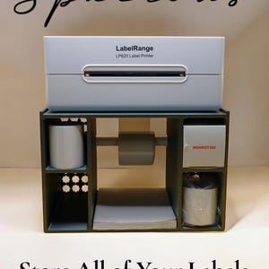 Soporte universal para impresora térmica de etiquetas con almacenamiento (impreso en 3D)