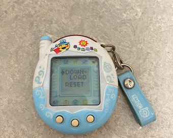 BANDAI ORIGINAL Tamagotchi White With Blue Detail - #1800, 1996
