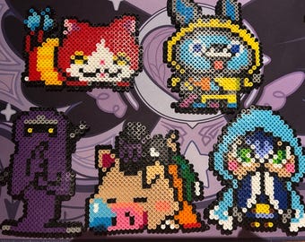 May include: A collection of colorful pixel art figures, including a red and white cat-like character, a blue rabbit, a purple ghost, a tan horse, and a blue-haired girl. The figures are made of small, round beads.