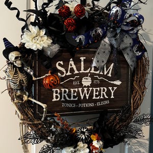 Halloween in Salem, this whimsical, little bit spooky wreath will add flare to any door!