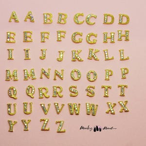 2 piezas de letras en inglés de la A a la Z, diamantes de imitación metálicos 3D dorados, dijes para decoración de uñas con piedras AB
