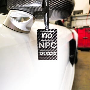 Carbon fibre NO NPC INSIDE sign rear view mirror pendant hanger ornament Bmw Audi Ford Honda Jdm Lexus Tesla Toyota vw vauxhall