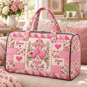 May include: A quilted duffel bag featuring a pink and white floral and gingham pattern. The design includes a central pink ribbon over a cross, surrounded by floral motifs and hearts. The text reads Grace, Hope, and Held by Faith.