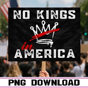 May include: A black sign held aloft in a crowd, bearing the white text "NO KINGS in AMERICA", with a white crown crossed out in red. The bottom of the sign reads "PNG DOWNLOAD" in white.