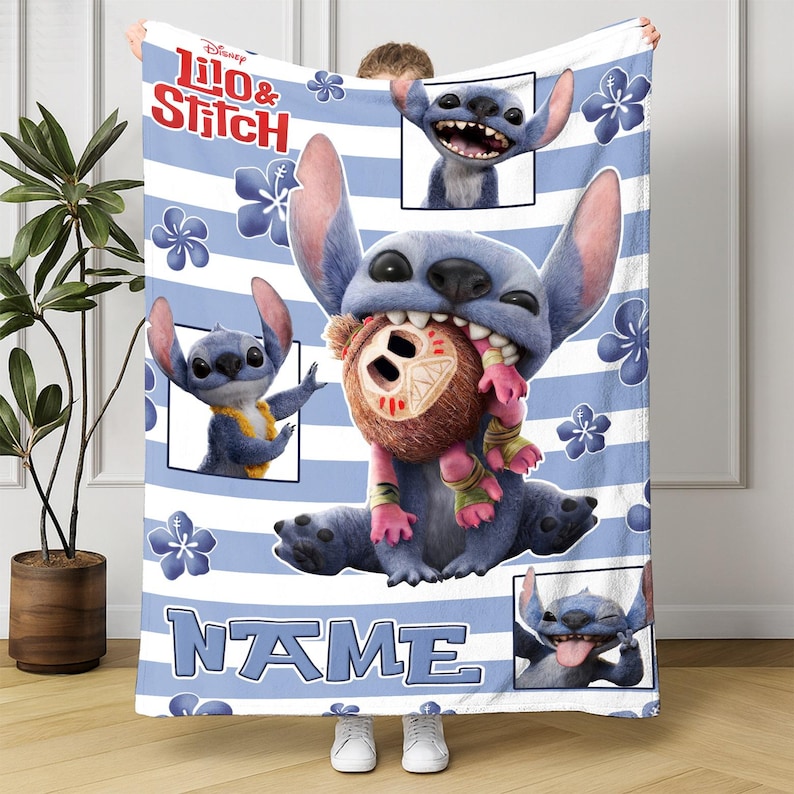 May include: A blue and white striped blanket featuring the Disney characters Stitch and a monkey. The blanket has the text "Lilo & Stitch" and "NAME" in blue. Stitch is shown in several poses, including one with a monkey in its mouth.