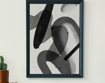 May include: A mid-century modern living room scene featuring a teal armchair, a small wooden side table with a cup, and a wooden cabinet with books and a cactus. A framed abstract art piece hangs on the wall.