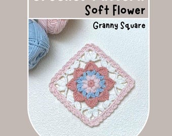 Puede incluir: Un patrón de granny square de crochet con una flor rosa suave con un centro azul. El patrón se llama "Soft Flower Granny Square".