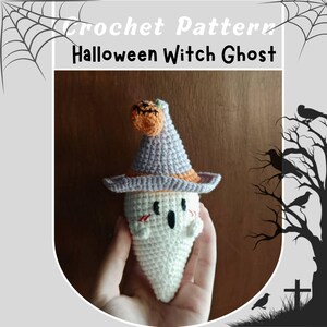 May include: Crochet pattern for a Halloween Witch Ghost. The handmade ghost is white with black eyes and a smiling mouth. It wears a gray witch hat with an orange brim and a pumpkin on top. The image includes a spiderweb and a tree silhouette.