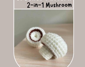 Op de afbeelding: Twee gehaakte paddenstoelen, een met een bruin-witte dop en de andere met een witte dop. De paddenstoelen liggen op een licht houten oppervlak. Haakpatroon 2-in-1 Paddenstoel.
