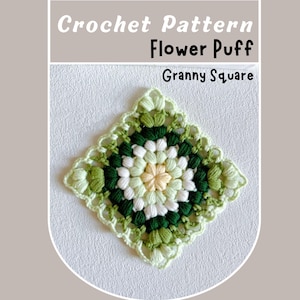 May include: A crocheted Flower Puff Granny Square in shades of green, white, and yellow. The square features a central flower design surrounded by multiple layers of textured stitches. The text "Crochet Pattern Flower Puff Granny Square" is displayed at the top.
