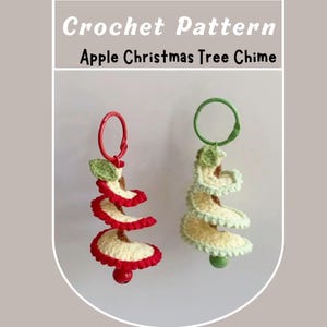May include: Two crocheted apple Christmas tree chimes. One has a red ring, red trim, and a red bead. The other has a green ring and bead. The text "Crochet Pattern Apple Christmas Tree Chime" is at the top.