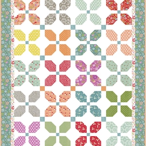 May include: A quilt pattern with a white background and a repeating pattern of colourful octagons arranged in a grid. The octagons are in shades of red, orange, yellow, green, blue, purple, and grey.