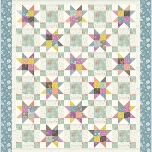 May include: A quilt with a patchwork design featuring a variety of floral patterns in shades of blue, pink, yellow, and green. The quilt is made up of a grid of squares, each containing a star-shaped design. The quilt is surrounded by a border of blue and white floral fabric.