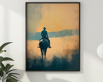 Op de afbeelding: Een ingelijst schilderij van een eenzame cowboy die op een paard in een zonsondergang rijdt. Het schilderij is in een gedempte kleurenpalet van blauw en bruin.