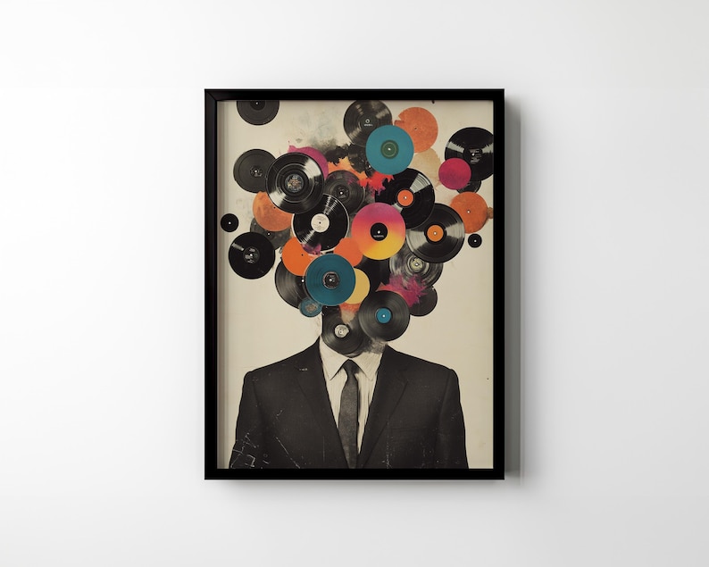 May include: A framed art print featuring a man in a black suit with a tie. His head is replaced by a collection of colorful vinyl records in various sizes. The records are in shades of black, orange, pink, and blue.