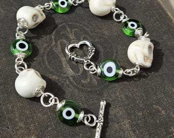 Howlite Skulls and Glass Evil Eye bracelet