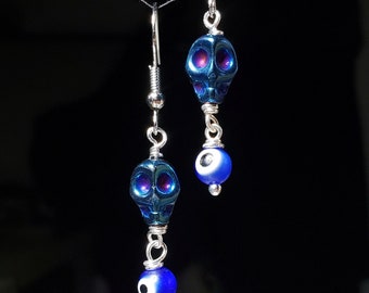 Titanium colored skulls and glass evil eye earrings