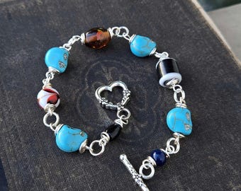Howlite Skulls and Repurposed Glass Bracelet