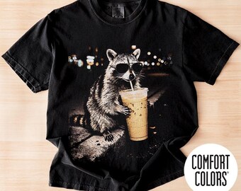 Comfort Colors Raccoon Drinking Iced Coffee Shirt, Funny Animal Meme Tee, Coffee Lover Raccoon Shirt, Gift For Women and Man Unisex T-Shirt