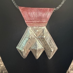 Silver Tuareg Khamza on engraved leather