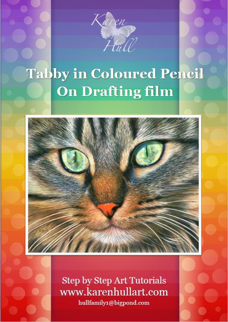 May include: A close-up of a tabby cat's face drawn in colored pencil on drafting film. The cat's green eyes are the focal point of the image. The artist's name, "Karen Hull", is at the top of the image, along with the title "Tabby in Colored Pencil on Drafting Film". The image also includes the artist's website and email address.