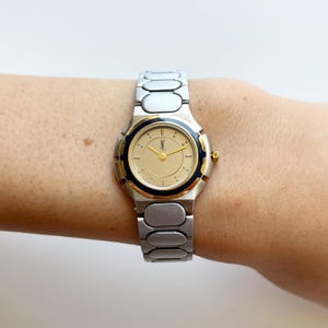 Yves Saint Laurent Vintage Silver Dial Stainless Steel Women’s Quartz Watch