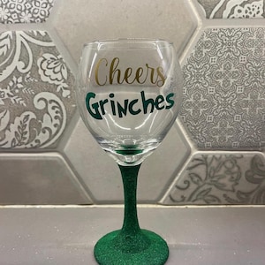 Drink Up Grinches Glitter Wine Glass