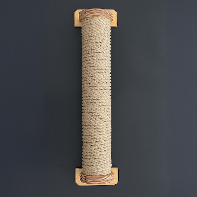 May include: A vertical cat scratching post with a beige rope-wrapped column. The column is attached to rectangular wooden bases at the top and bottom. The background is a solid dark gray.