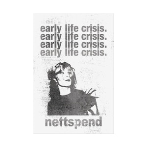 May include: A black and white print featuring a distressed design with the text "early life crisis" repeated multiple times. A grayscale illustration of a person is below the text, with the word "neftspend" at the bottom.