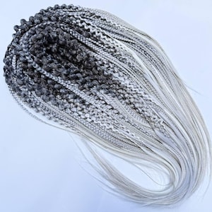 Synthetic braid extensions mix textures.Double braids, twists from dark to light natural looking.Set of braids mix colors black, gray, blond