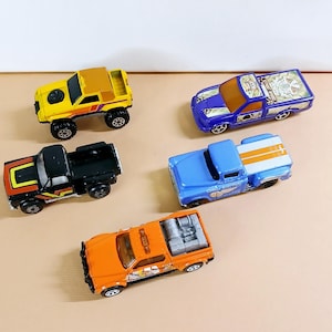 Vintage 5 Diecast Trucks, 4 Pickup Trucks, and  Gulch Stepper 4x4