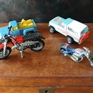 Updated Now 4 Diecast Motorcycles, Kawasaki Ridge Rider Dirt Bike, Blast Lane Blue Flame Motorcycle, Ford Bronco & Blue Pickup Truck
