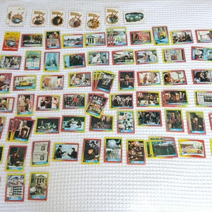 Topps 1989, Cartes et autocollants Retour vers le futur II, 59 cartes sur 88, avec quelques copies, 7 autocollants sur 11, pochettes