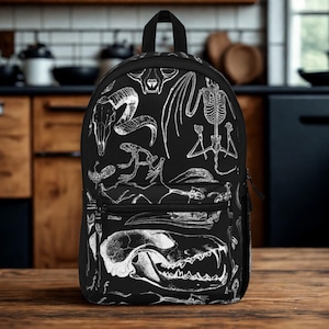 Sac à dos gothique squelette avec imprimé crâne d'animal macabre pour l'école, les voyages ou un usage quotidien Sac à dos esthétique sorcière avec poche avant