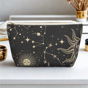 Trousse de maquillage céleste Pochette cosmique Pochette pour accessoires inspirés de l'astrologie Trousse de voyage design soleil Trousse à crayons pour école Design soleil et lune