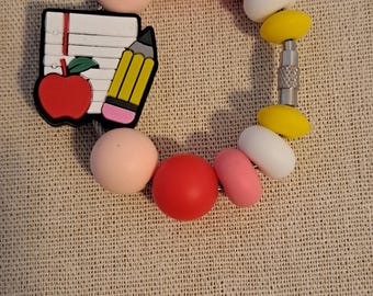 Dije de taza de enseñanza