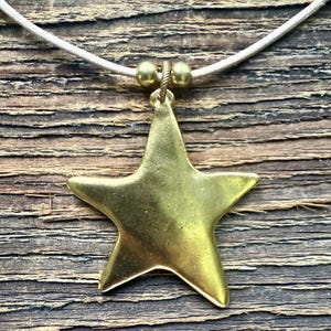 Leather and antiqued gold plated pewter star pendant necklace choker