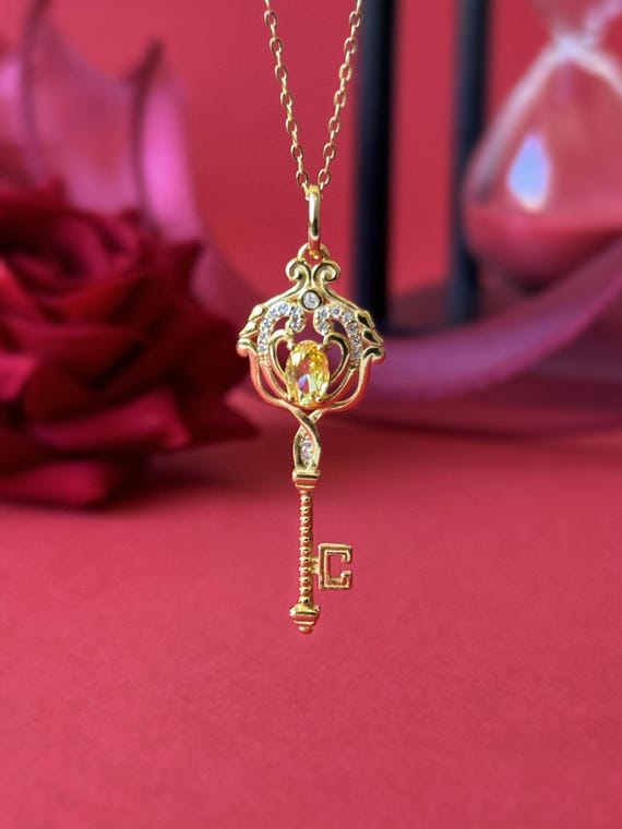 Nutcracker and the four realms key necklace deals