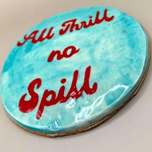 Handmade Ceramic Coaster – ‘All Thrill No Spill’ – Turquoise with Hand-Painted Red Lettering